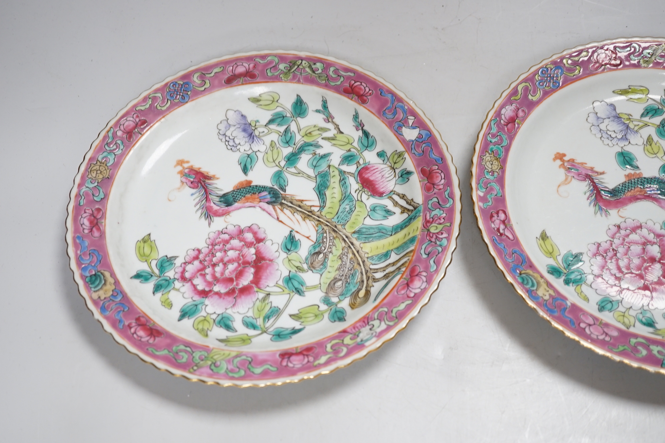 A pair of Chinese Straits famille rose plates for the Malaysian market, 23cm diameter